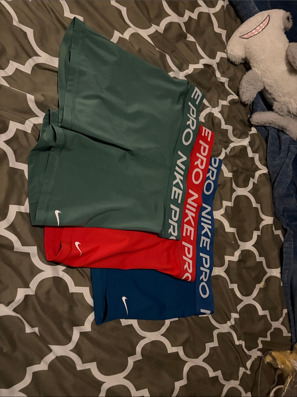 Nike Kids Compression Shorts in Green, Red, and Blue